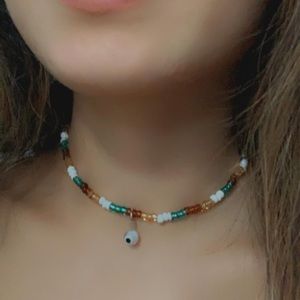 Hand made Beaded choker with evil eye charm